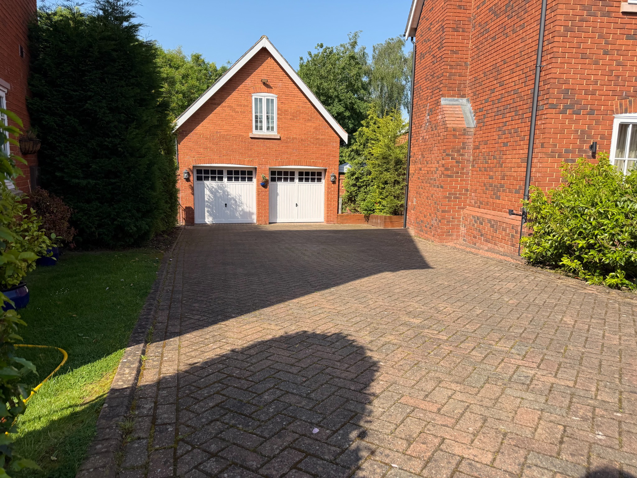 Block paving driveway before professional cleaning